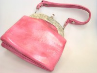 Rosafarbene Handtasche aus Leder